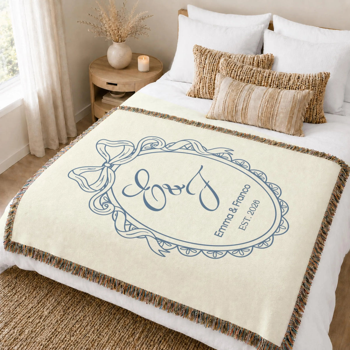 Personalized couple woven blanket styled on a neutral bedroom bed