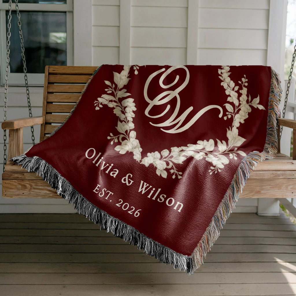 Custom burgundy wedding woven blanket with floral monogram and couple names