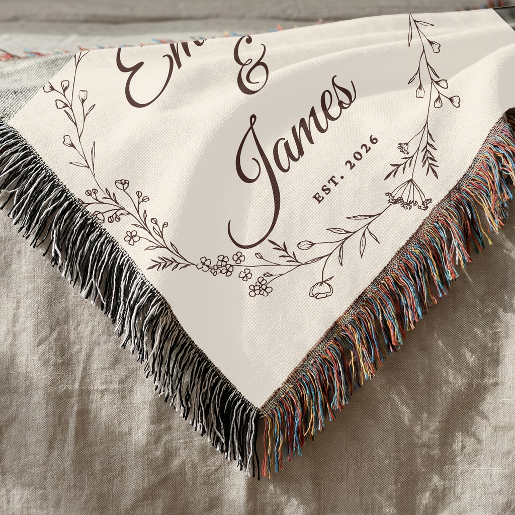 Close up of personalized wedding woven blanket showing cotton texture and decorative fringe
